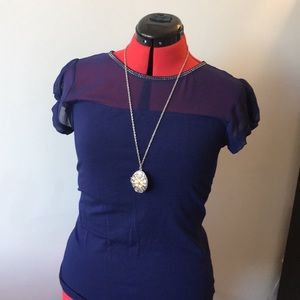 Navy blue top with sheer & neckline embellishment